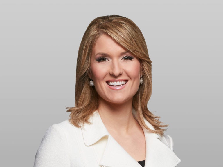 Michelle-on-grey-crop Image of as Michelle Dubé