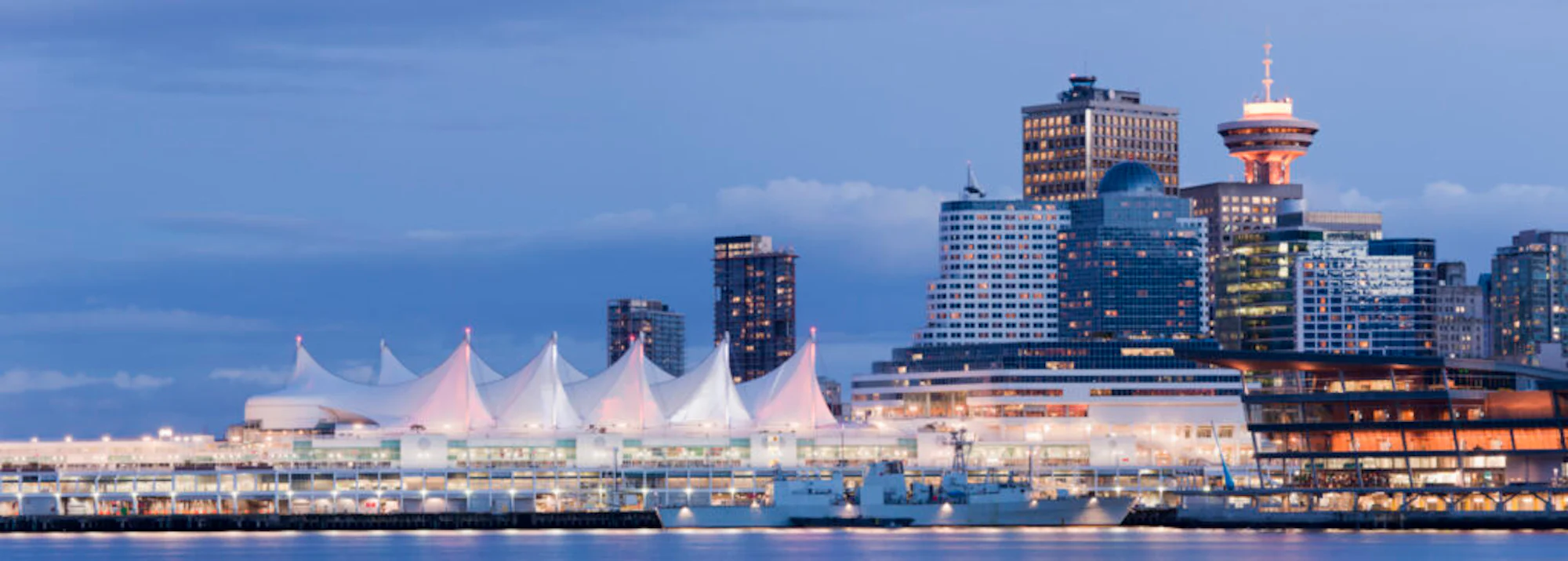 "The Vancouver skyline across Coal Harbour at twilight, Canada."