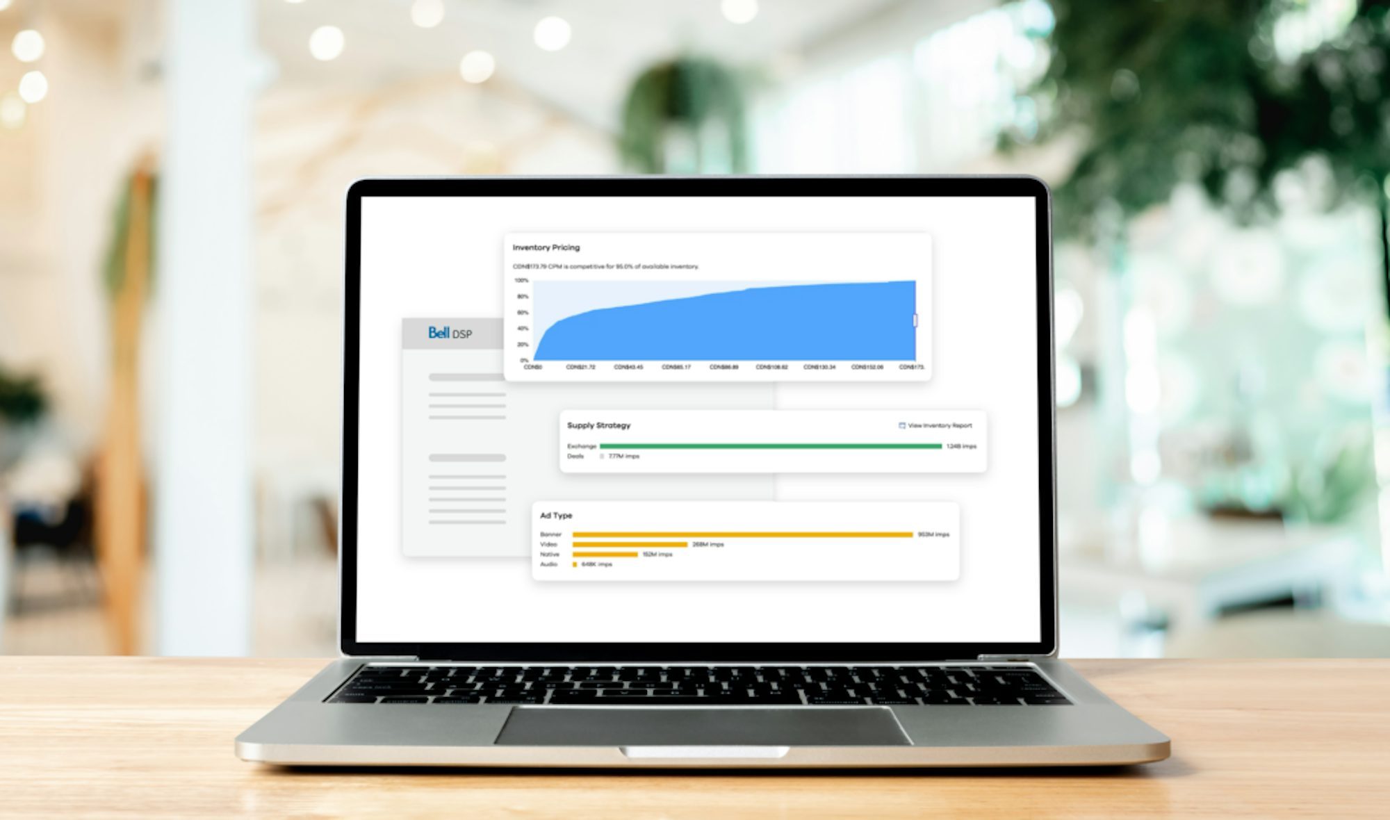 Laptop on a table with a graphic of the Bell DSP in the screen.