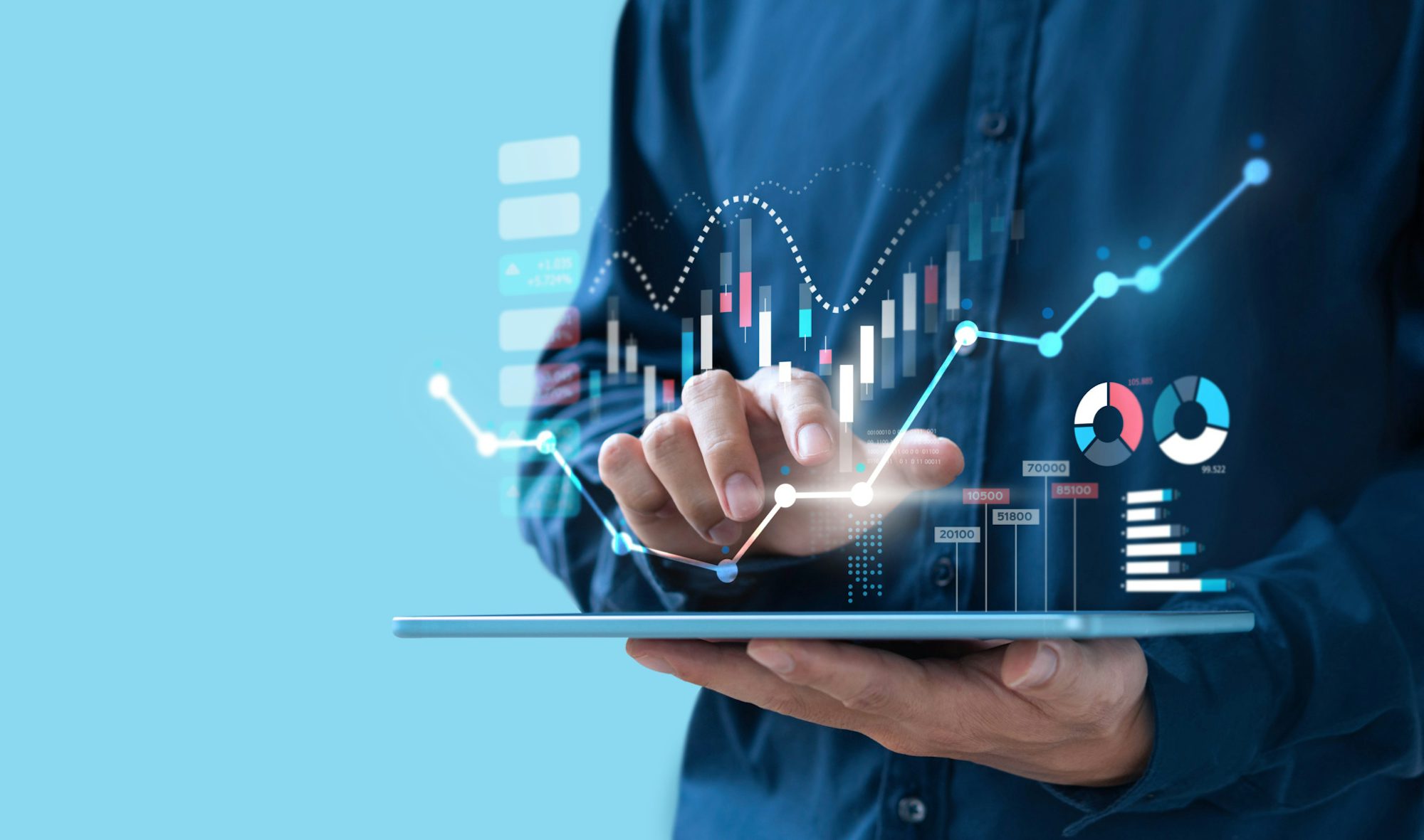 Men holding a tablet with graphs and charts coming out of it showcasing the power of Bell First Party Data.