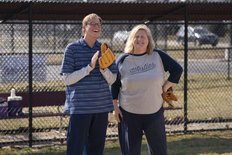 Joel and Tricia Miller playing baseball