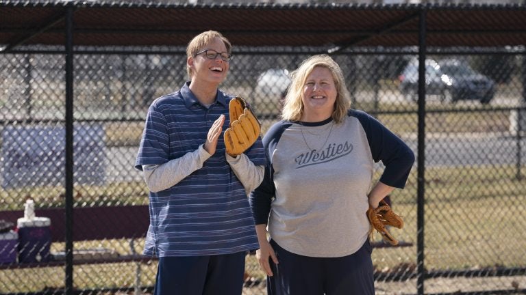 Joel and Tricia Miller playing baseball