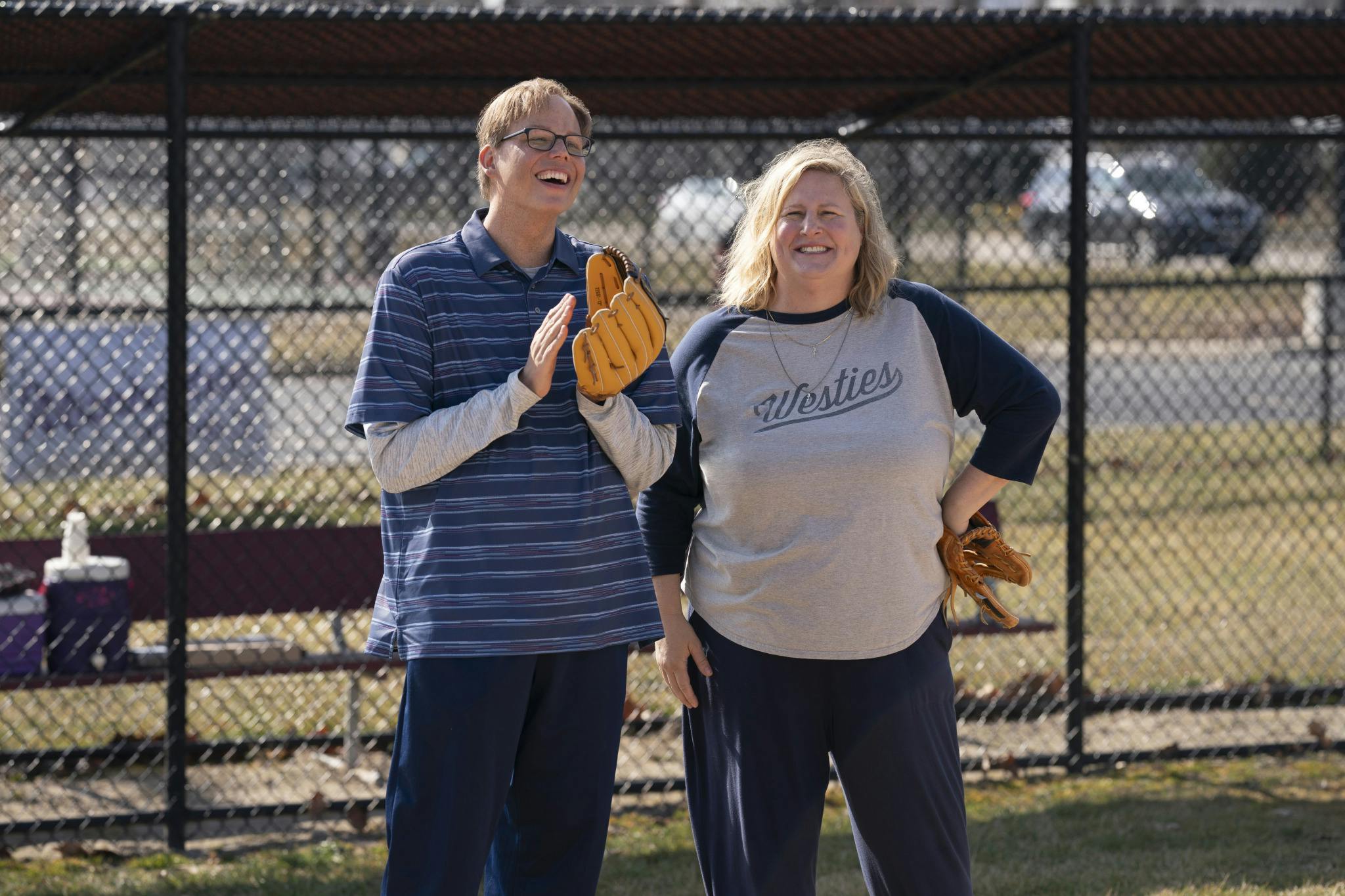 Joel and Tricia Miller playing baseball