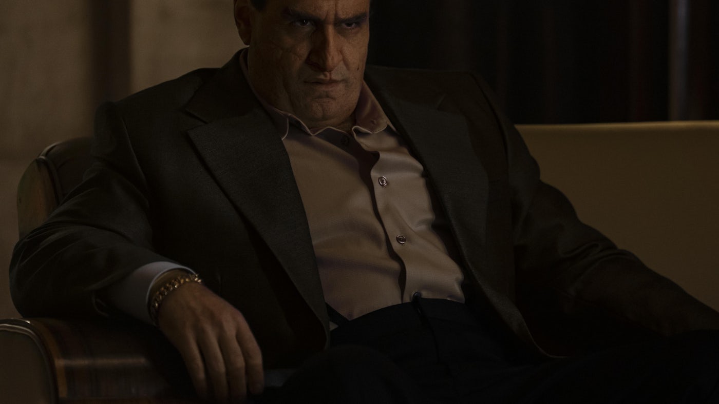 The Penguin sitting down