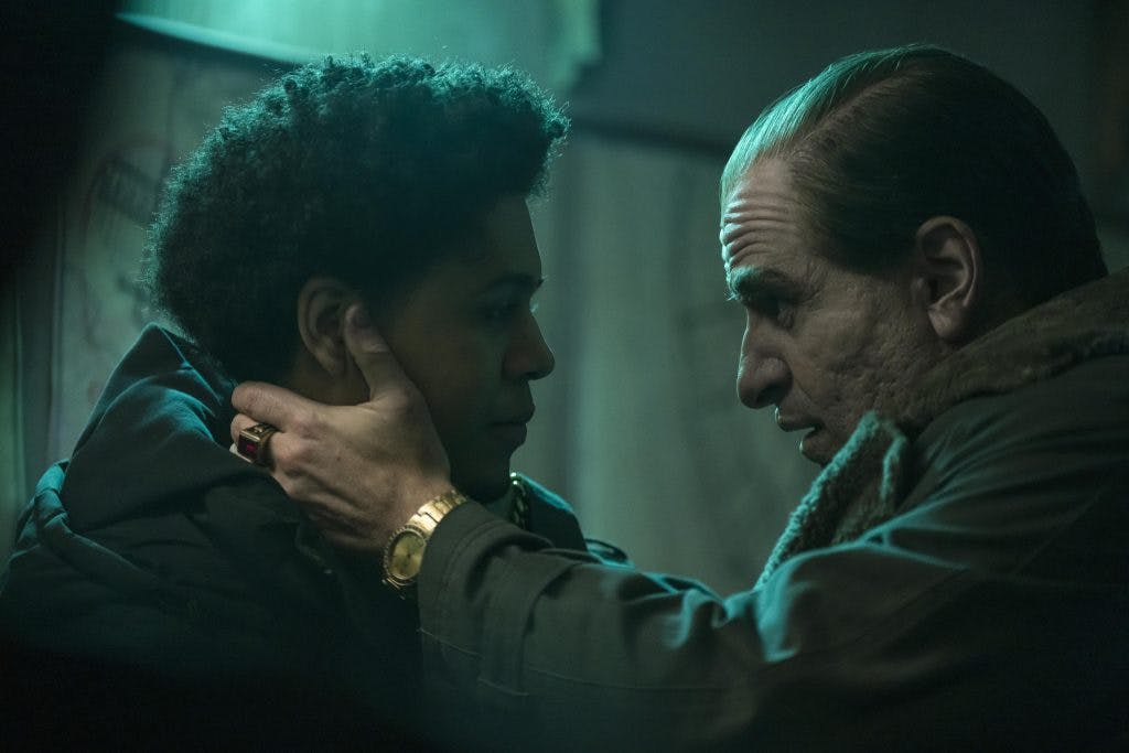 The Penguin holding Victor Aguilar