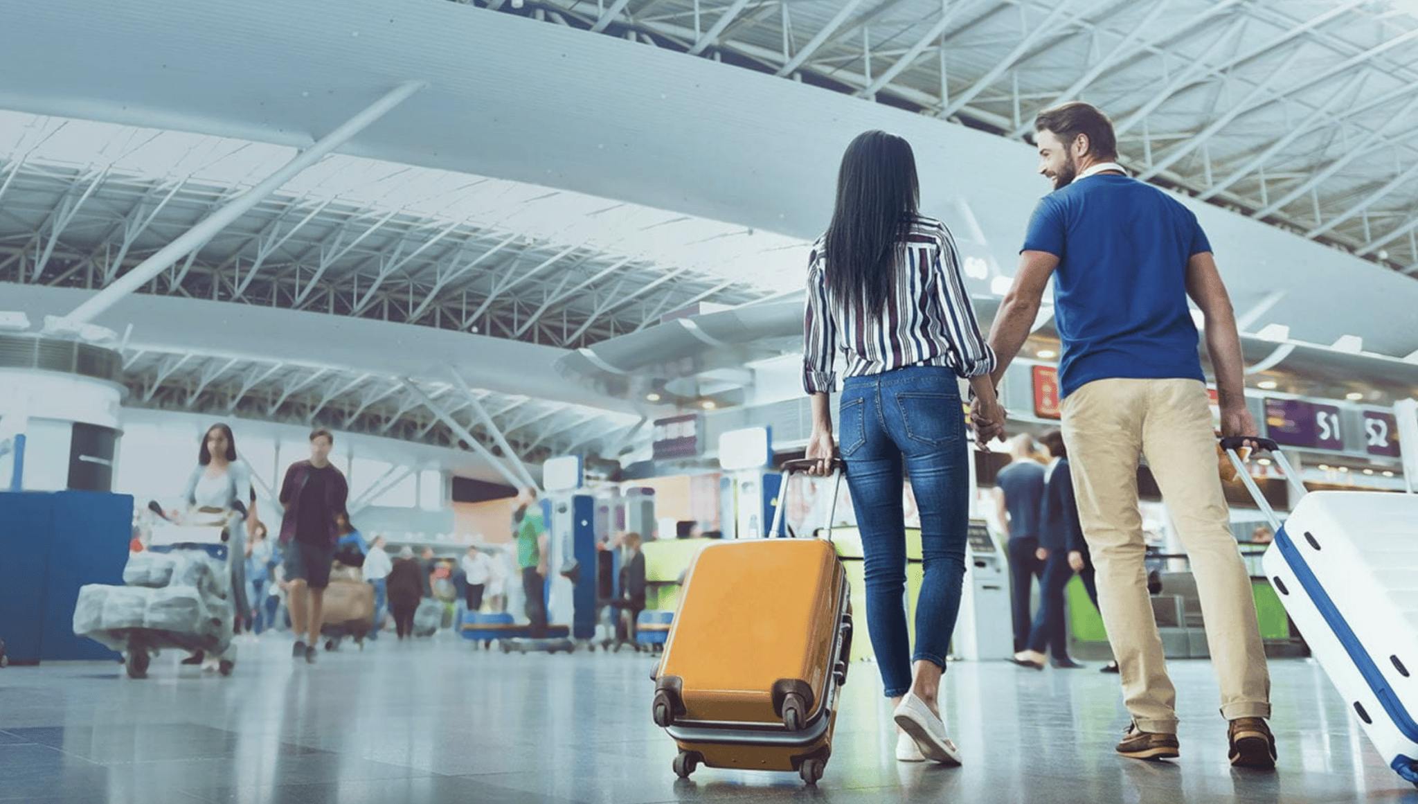 people with luggages at the airport